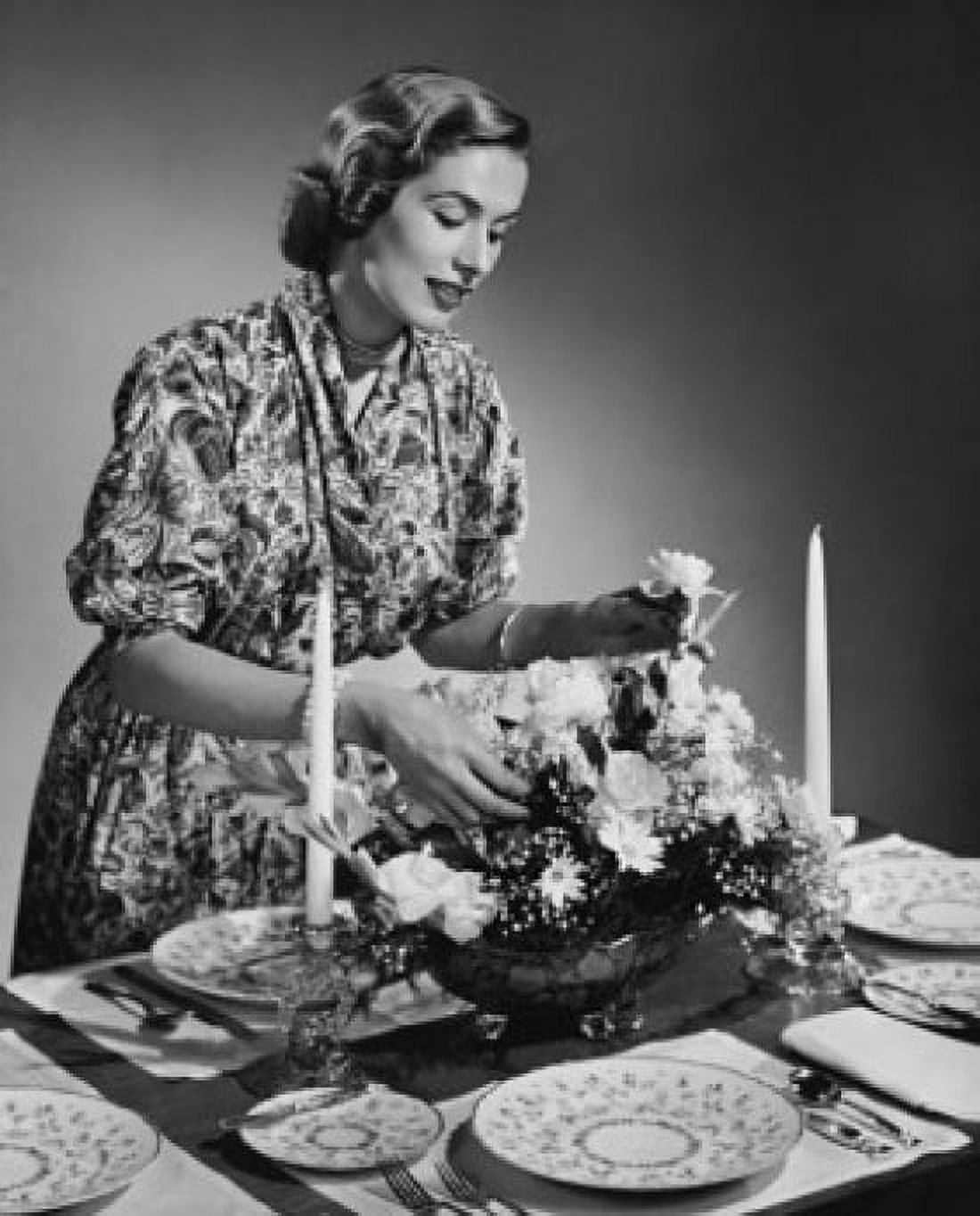 Young woman setting a dining table Canvas Art - (24 x 36)