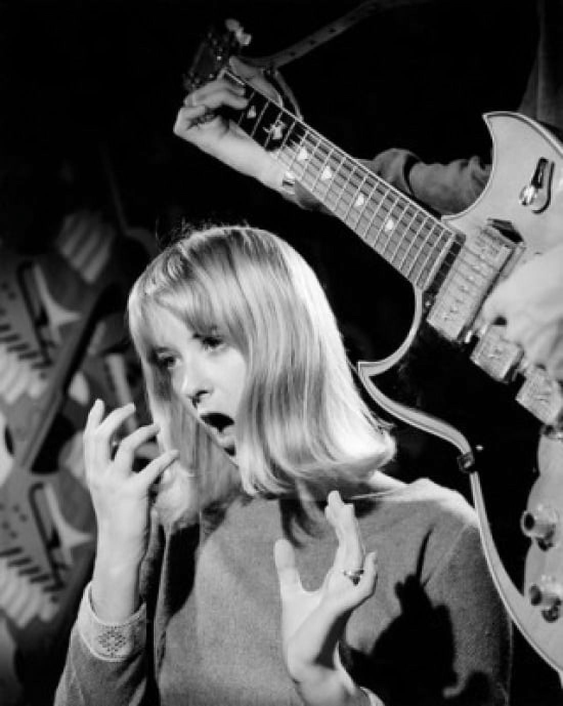 Young woman singing with an electric guitarist Canvas Art - (18 x 24)