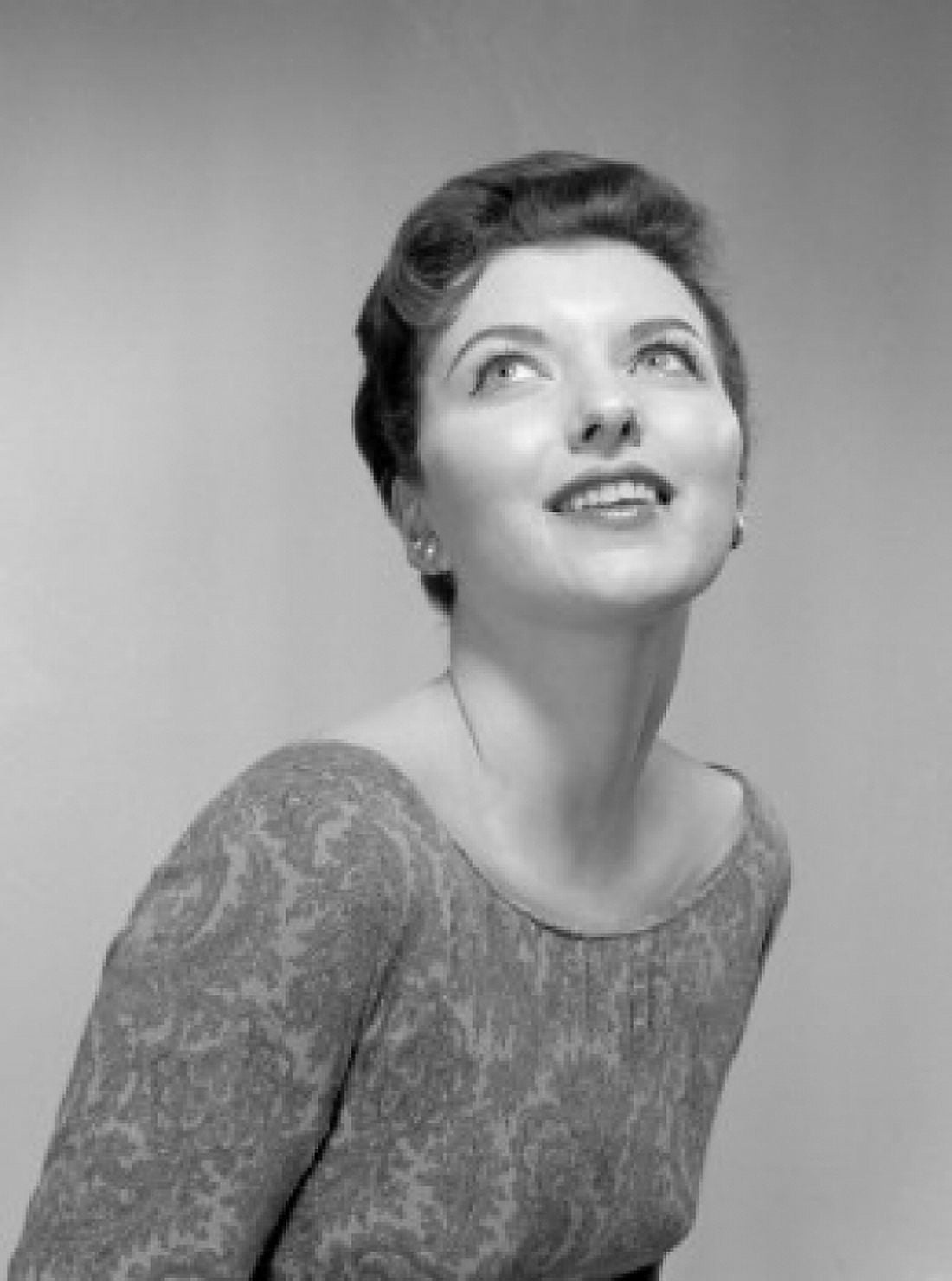 Young woman smiling looking up Canvas Art - (24 x 36)