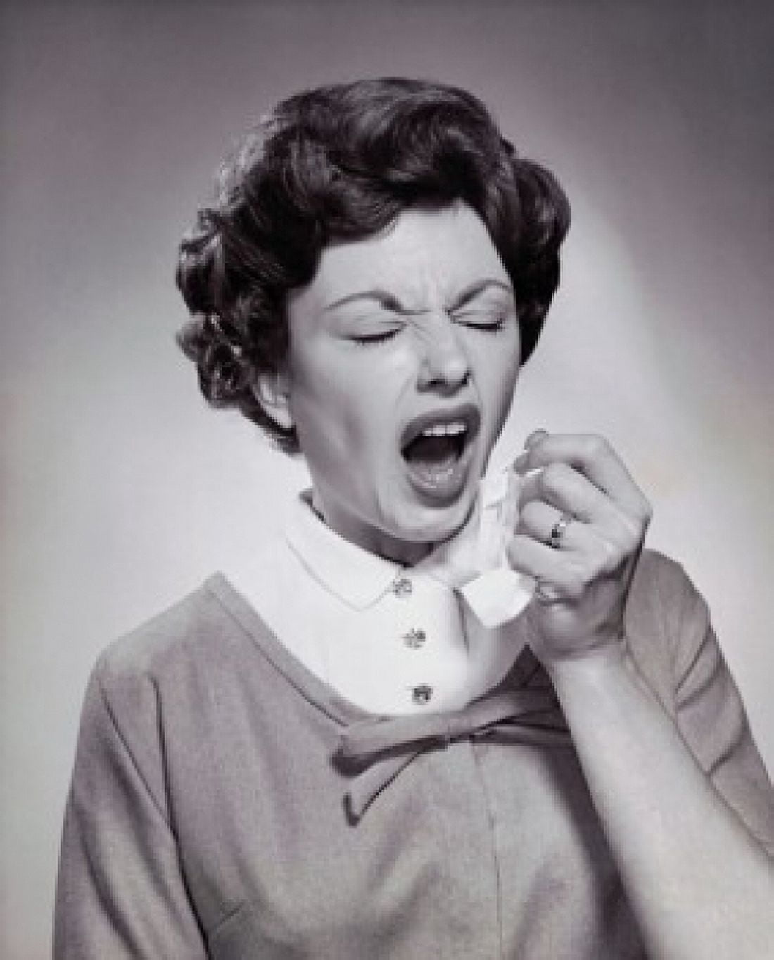 Young woman sneezing Canvas Art - (24 x 36)