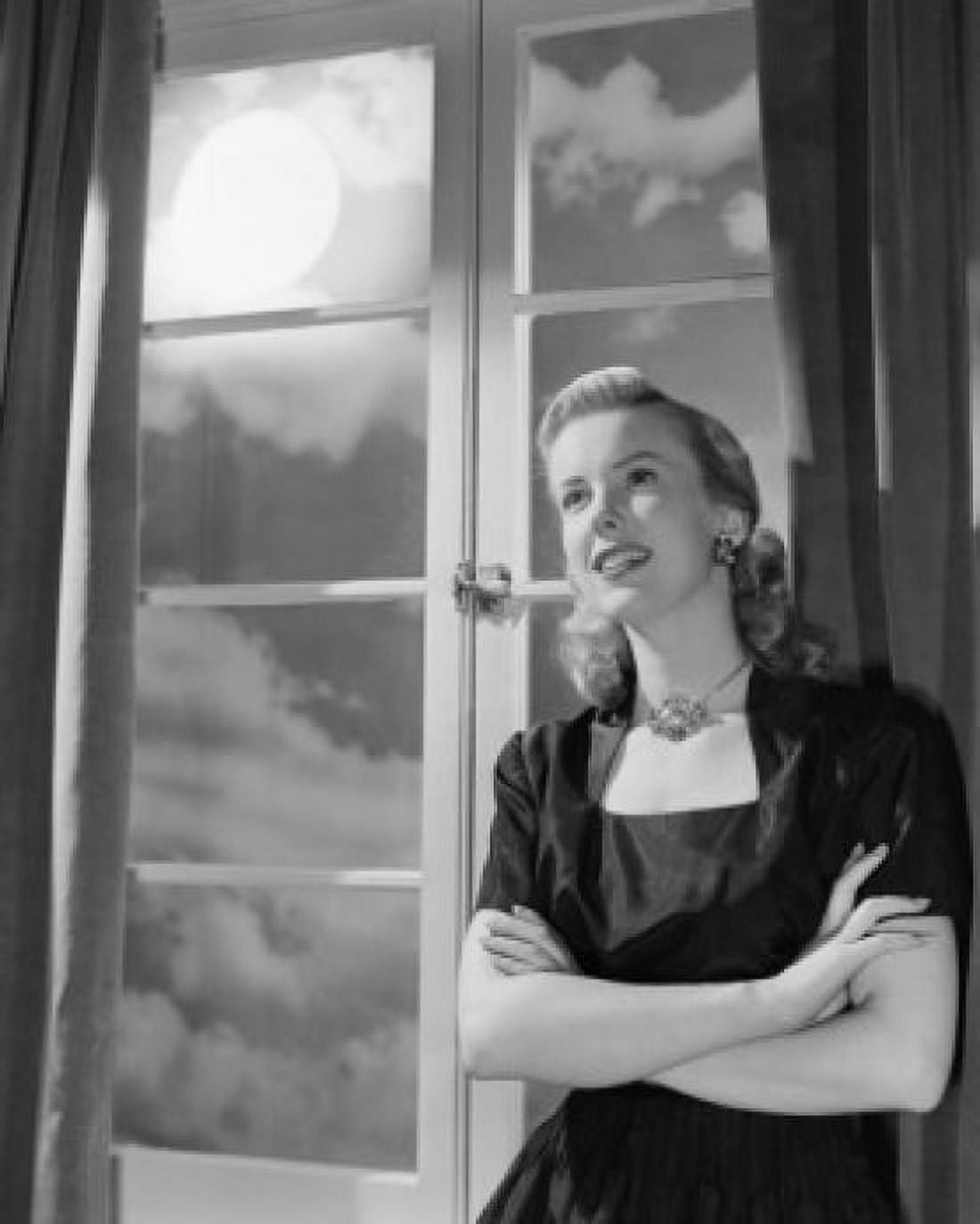 Young woman standing by door Canvas Art - (24 x 36)