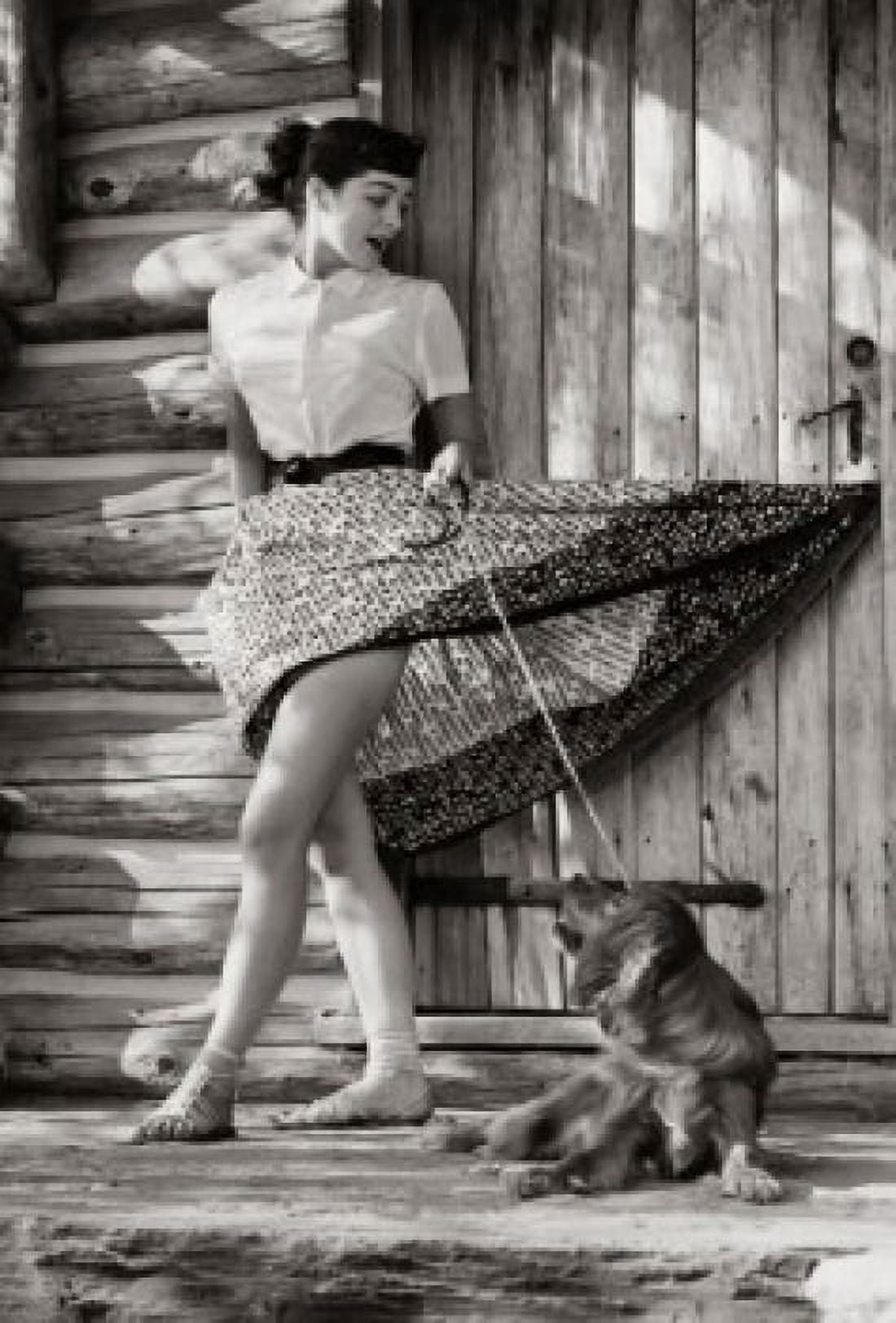 Young woman standing in front of her house with her dog Canvas Art - (18 x 24)