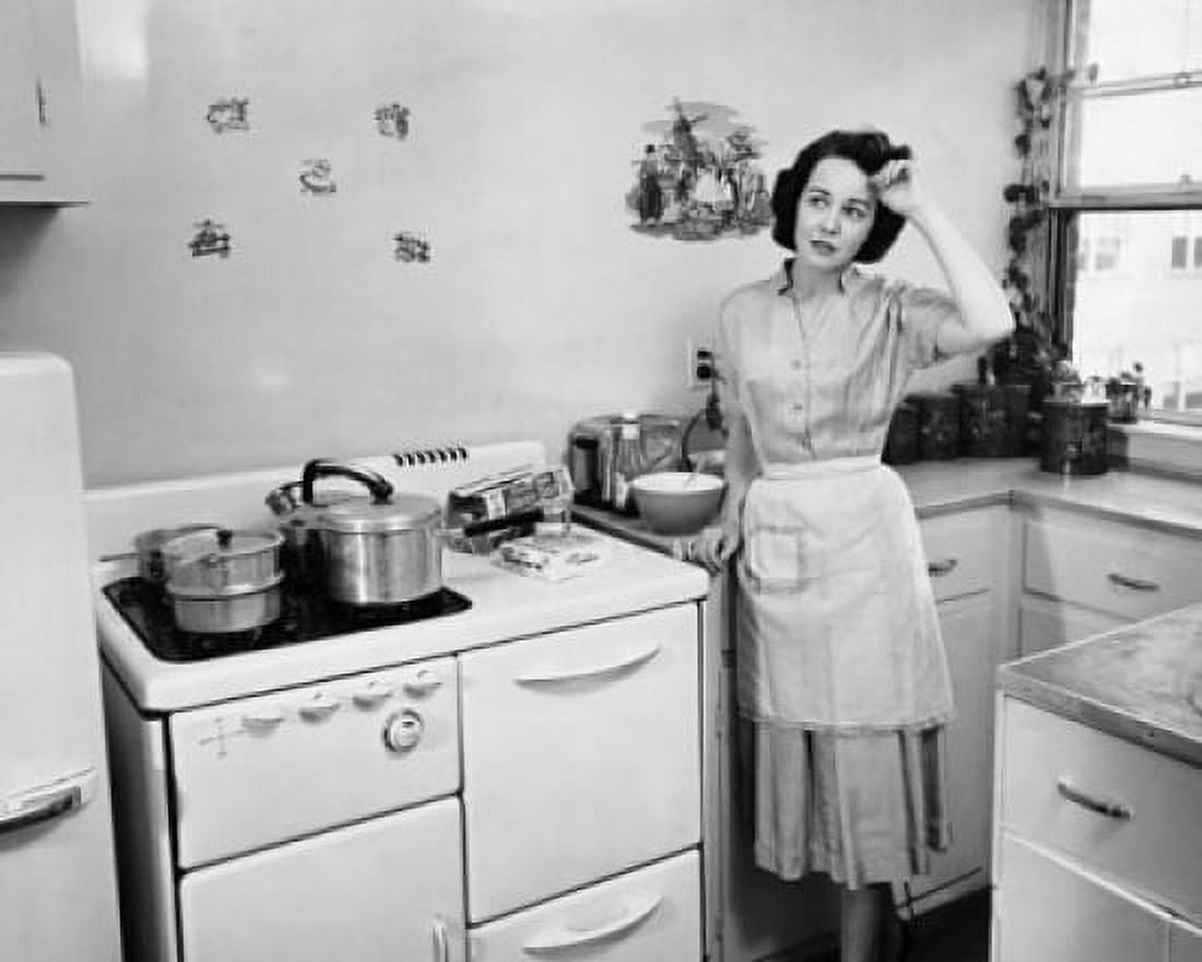 Young woman standing in the kitchen with her hand on her forehead Canvas Art - (24 x 36)