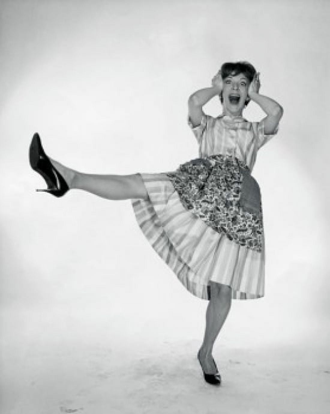 Young woman standing on one leg with her head in her hands Canvas Art - (18 x 24)