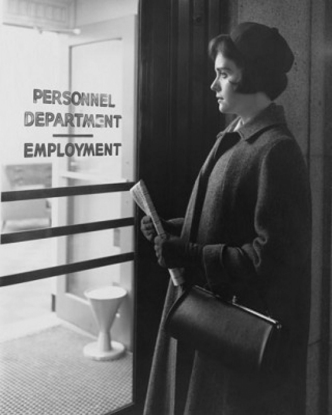 Young woman standing outside an employment office Canvas Art - (24 x 36)