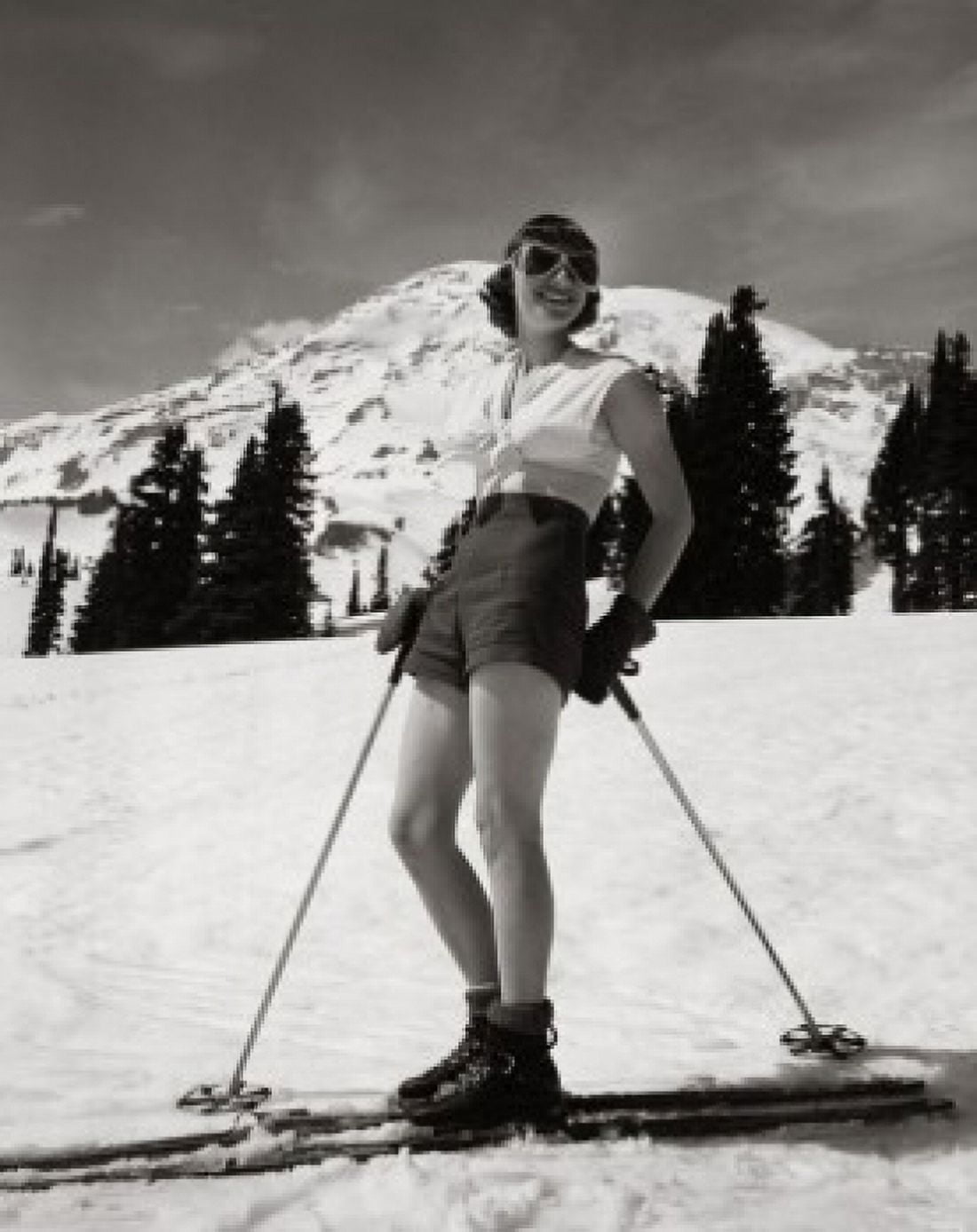 Young woman standing with skiing equipment and smiling Canvas Art - (18 x 24)