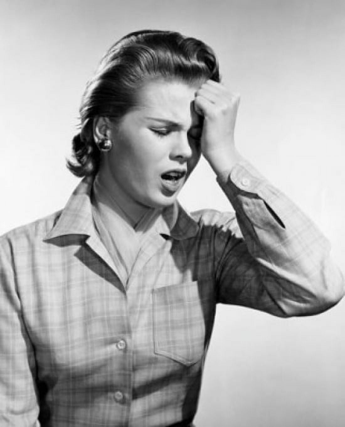 Young woman suffering from a headache Canvas Art - (24 x 36)