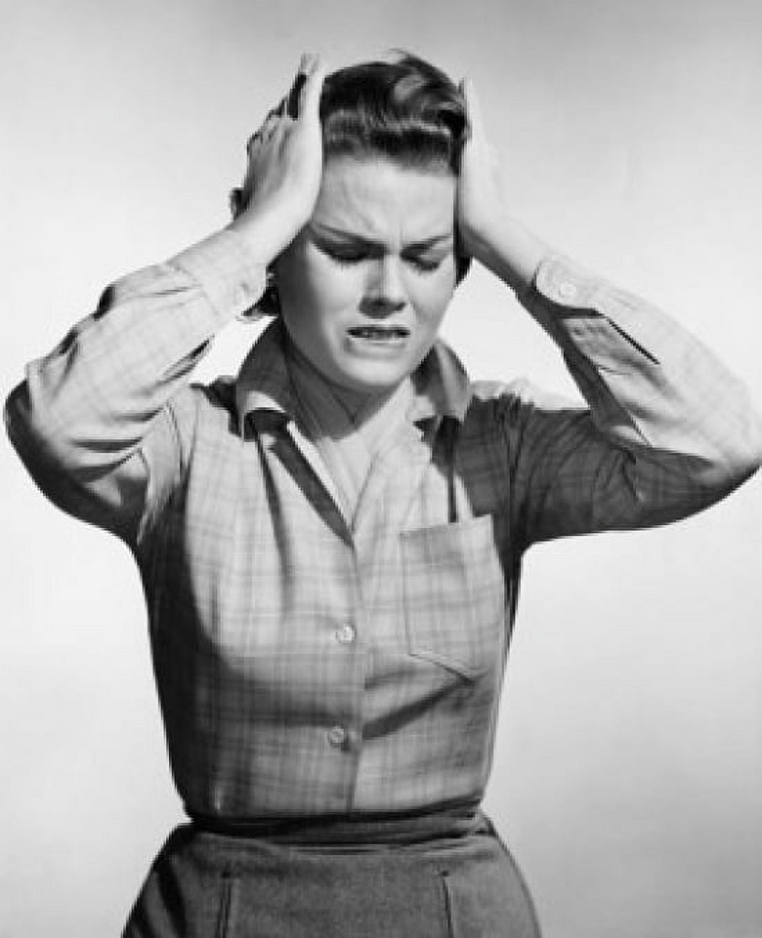 Young woman suffering from a headache Canvas Art - (24 x 36)