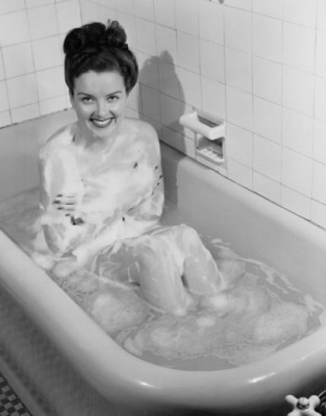 Young woman taking bath Canvas Art - (18 x 24)
