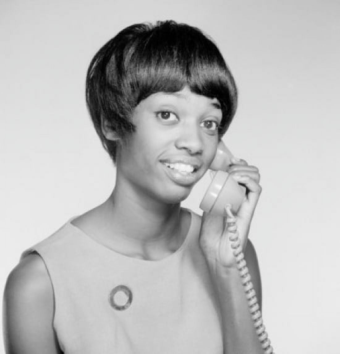 Young woman talking on landline phone Canvas Art - (18 x 24)