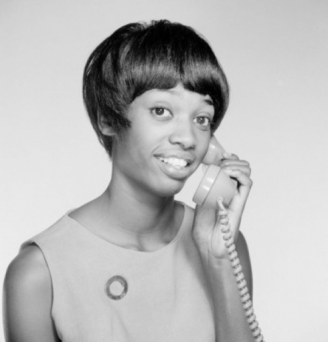 Young woman talking on landline phone Canvas Art - (24 x 36)