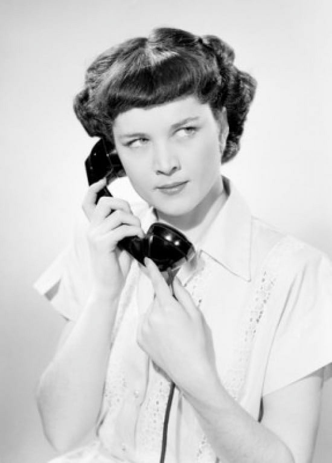 Young woman using telephone Canvas Art - (24 x 36)