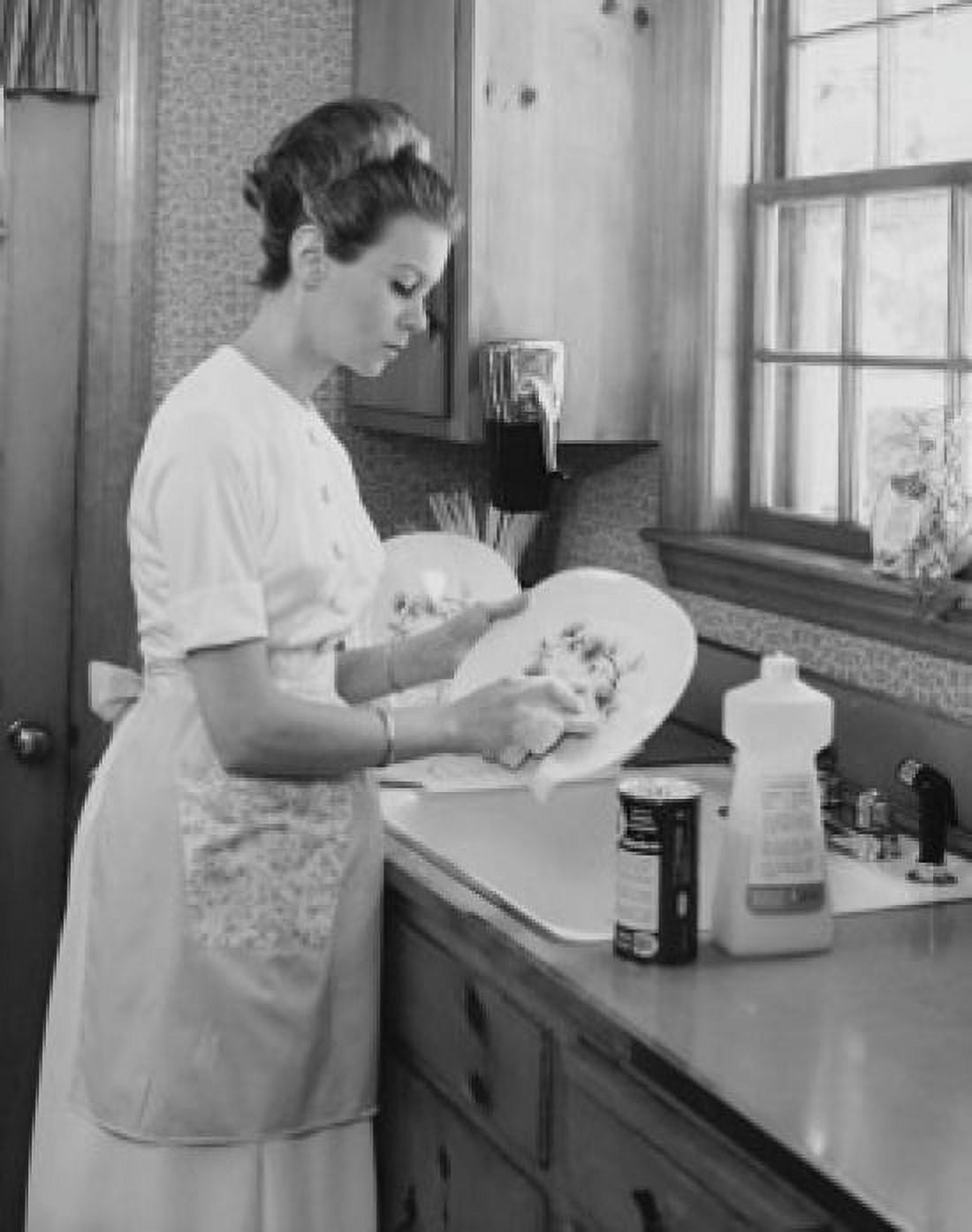 Young woman washing dishes in kitchen Canvas Art - (18 x 24)