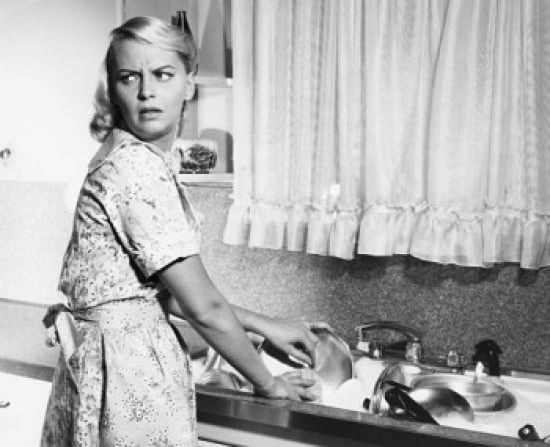 Young woman washing dishes in kitchen Canvas Art - (18 x 24)