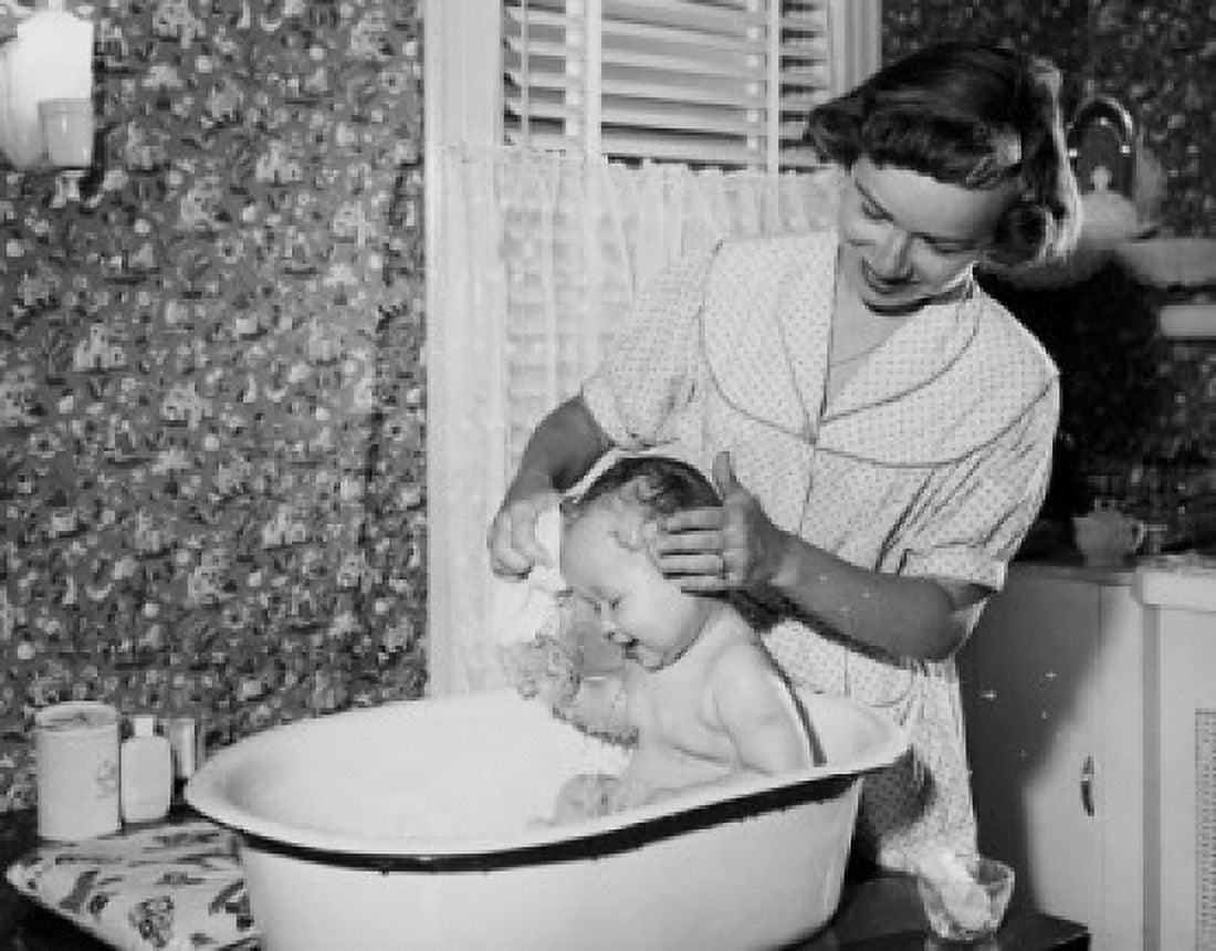 Young woman washing her son in a bathtub Canvas Art - (18 x 24)