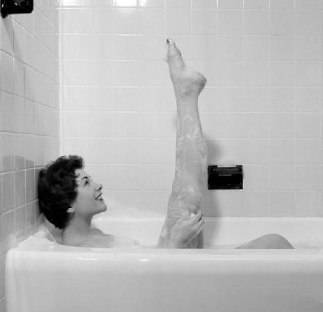 Young woman washing in bath Canvas Art - (24 x 36)