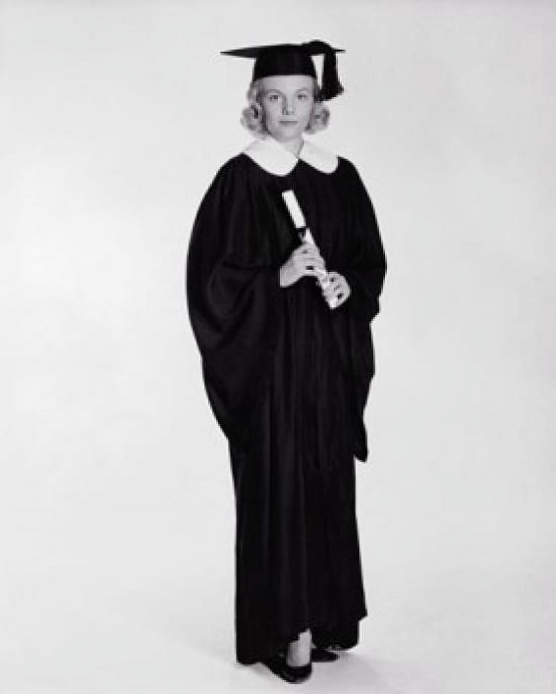 Young woman wearing a graduation gown and holding a diploma Canvas Art - (24 x 36)