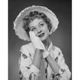 thumbnail image 1 of Young woman wearing hat, smiling Poster Print (24 x 36), 1 of 4