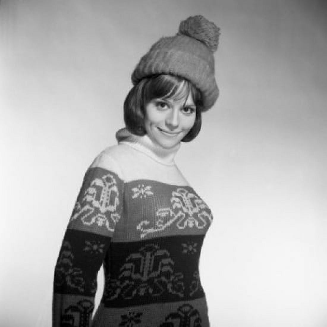 Young woman wearing knit hat and warm sweater smiling Canvas Art - (24 x 36)