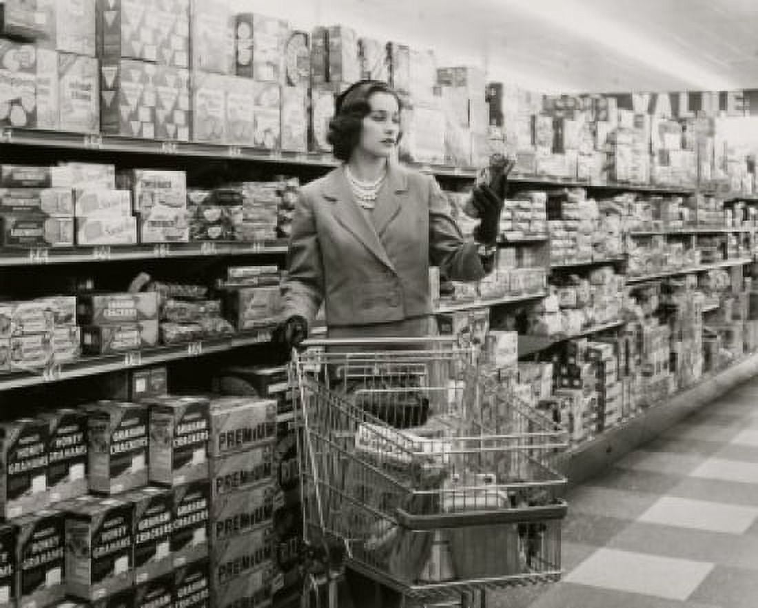 Young woman with a shopping cart in a grocery store Canvas Art - (18 x 24)