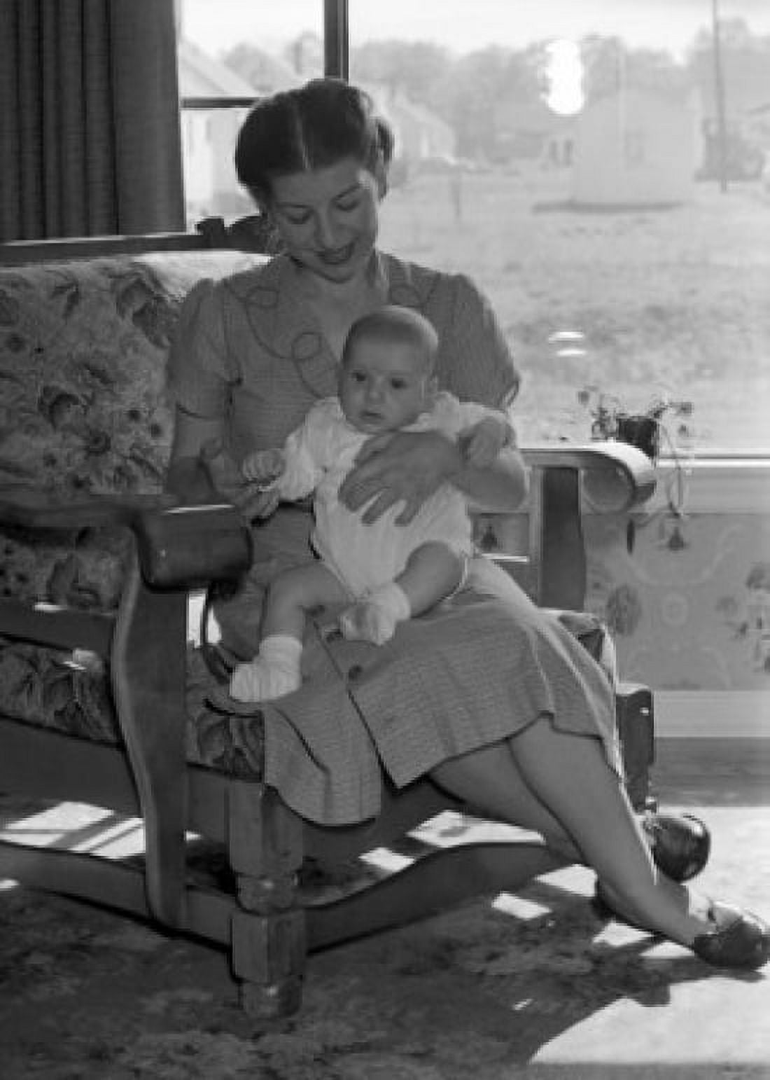 Young woman with baby sitting on lap Canvas Art -  (18 x 24)