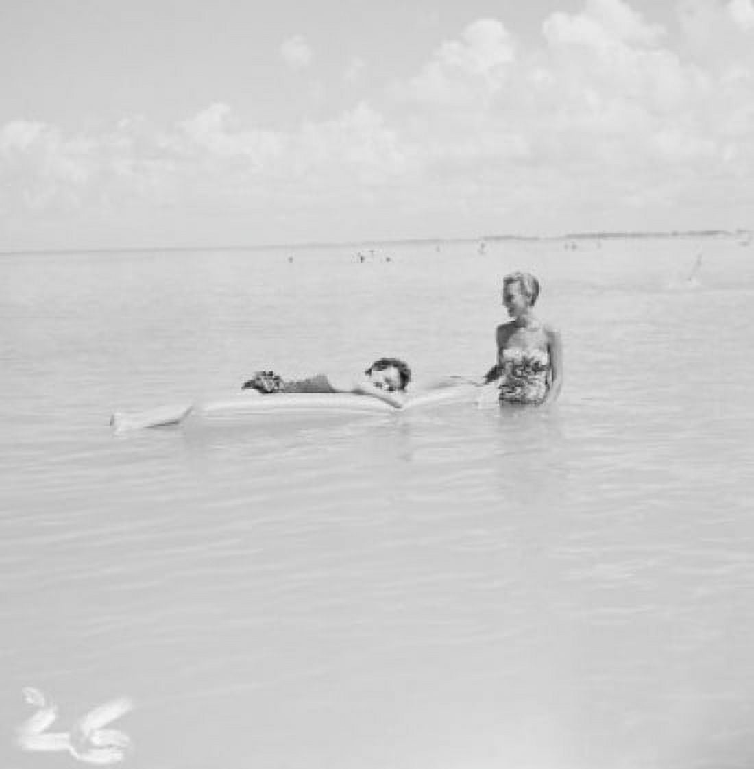 Young women relaxing in sea Canvas Art - (18 x 24)