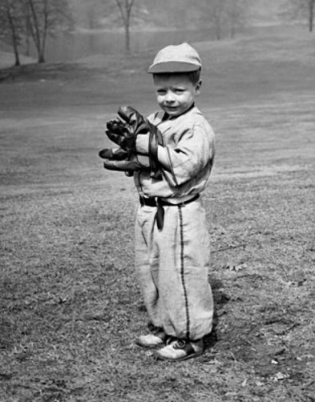 Youth league baseball player standing on a baseball field Canvas Art - (24 x 36)