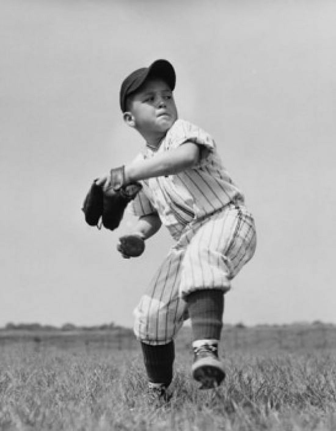 Youth league baseball player throwing baseball Canvas Art - (24 x 36)