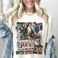 thumbnail image 1 of ZENUA Jonas Brothers 20Th Anniversary Shirt, Jonas Fan Merchandise Gift, Vintage Living The Dream Tour 2025 Tee Hot Trending Shirt/Sweatshirt/Hoodie, 1 of 4