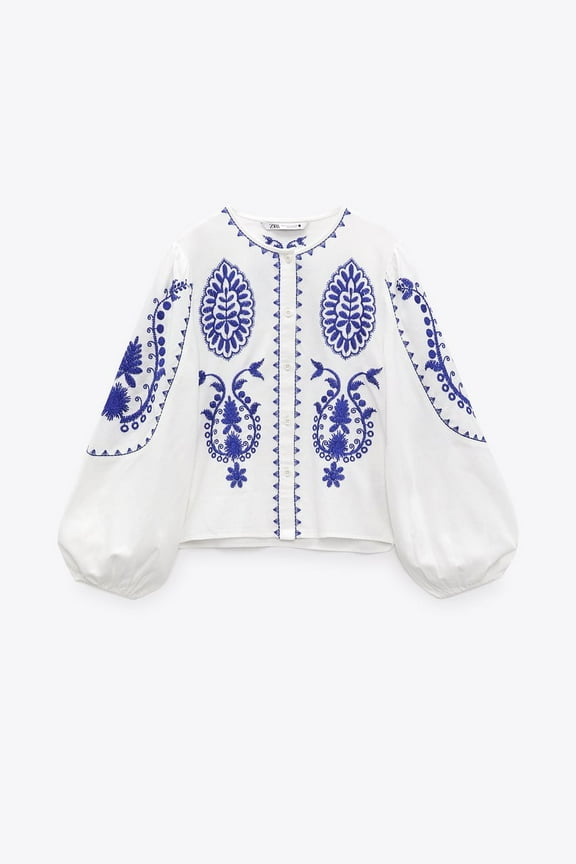 BLOUSE WITH CONTRASTING EMBROIDERY