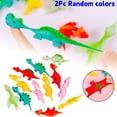 thumbnail image 1 of 2Pc Slingshot Dinosaur Finger Toys Sticky,Dinosaur Finger Slingshot Toys,Flick Stretchable Rubber Dino Catapult Toys,Flying Stretchy Animals For Party Favor Gifts,Shooter Games,Random Colors, 1 of 9