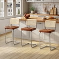 thumbnail image 1 of Zesthouse 26″ Natural Rattan Counter Stools Set of 3, Mid Century Modern Bar Stools with Cane Back & Chrome Legs, Cantilevered Design, Upholstered Faux Leather Barstools for Kitchen Island, Brown, 1 of 11