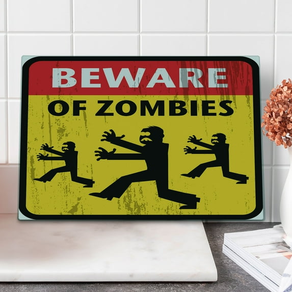 Zombie Cutting Board, Beware of the Zombies Fiction Humor Sign Warning Emblem Modern Graphic Art, Decorative Tempered Glass Cutting and Serving Board, Large Size, Yellow Black Red, by Ambesonne