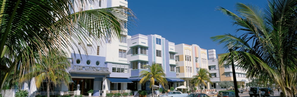 This is the art deco district of South Beach Miami The buildings are painted in pastel colors surrounded by tropical palm trees Canvas Art - Panoramic Images (36 x 12)