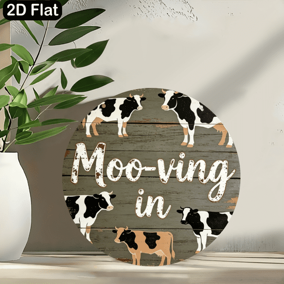 A circular wooden sign with the theme "Moo-ving in". Beautiful hanging ornaments that can be hung anywhere in the home. 2D flat design. Size: 8 * 8 inches.