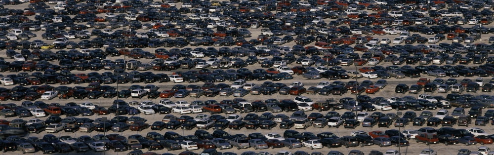 This is a commuter parking lot across from Manhattan or New York New York There are rows and rows of cars parked side by side Canvas Art - Panoramic Images (36 x 12)