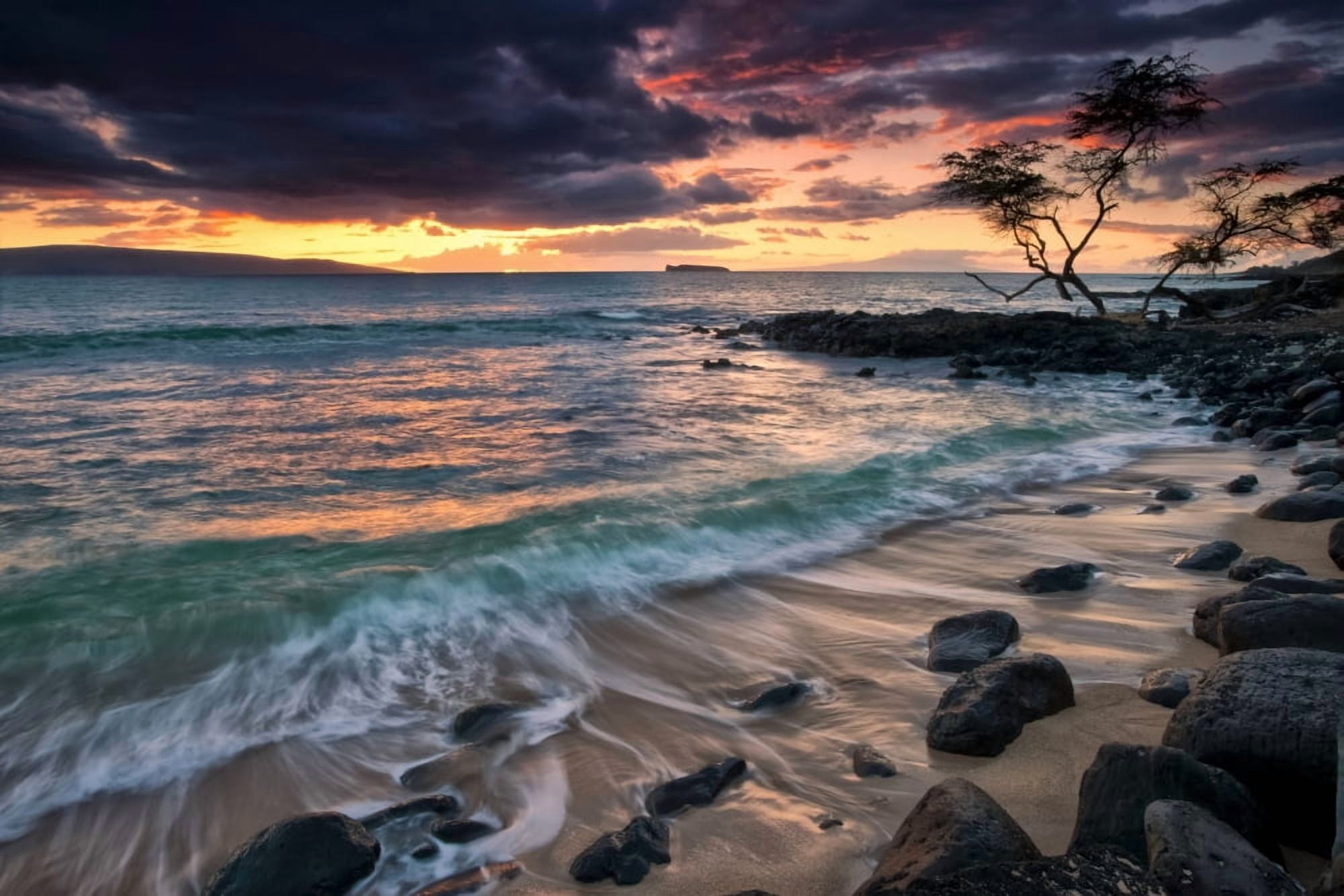 A dramatic sky at sunset over a turquoise ocean along the coast of a hawaiian island Hawaii United States of America Canvas Art - Scott Mead  Design Pics (38 x 24)