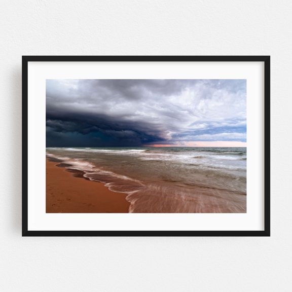 A dramatic storm front looms over the tranquil ocean, contrasting nature's calm and powerful forces. - Valencia Valencian Community Spain Photography Black Framed Wall Art Print 5 x 7 inches
