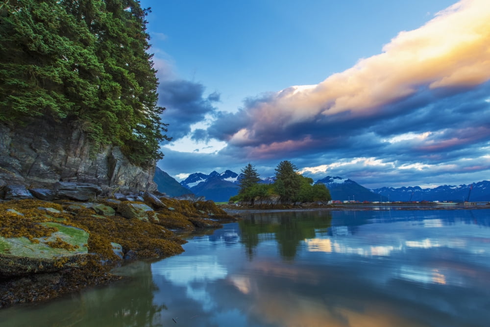 At the end of Dock Point in Valdez low tide makes it possibly to walk below its seaside cliffs Valdez Alaska United States of America Canvas Art - Zachary Sheldon Design Pics (38 x 24)