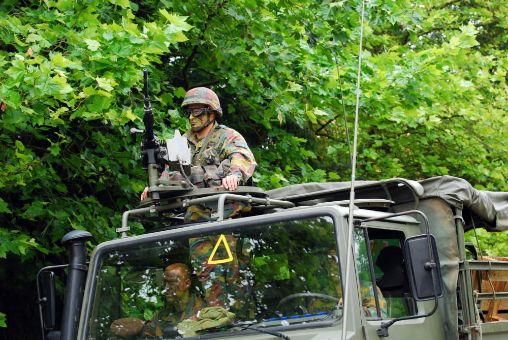 An infantry soldier of the Belgian Army mans a FN MAG machine gun mounted on top of the Unimog vehicle Canvas Art - Luc De JaegerStocktrek Images (17 x 12)