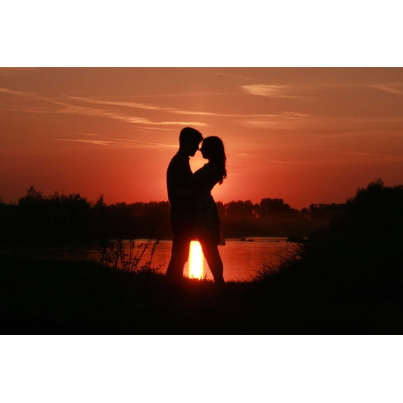loving couple at sunset Photographic Print Poster