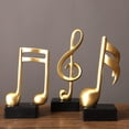 thumbnail image 1 of mdesiwst Music Note Sculpture Gold Resin Musical Symbol Figurine Modern Tabletop Decoration for Piano Room Home Office Table Centerpiece, 1 of 8