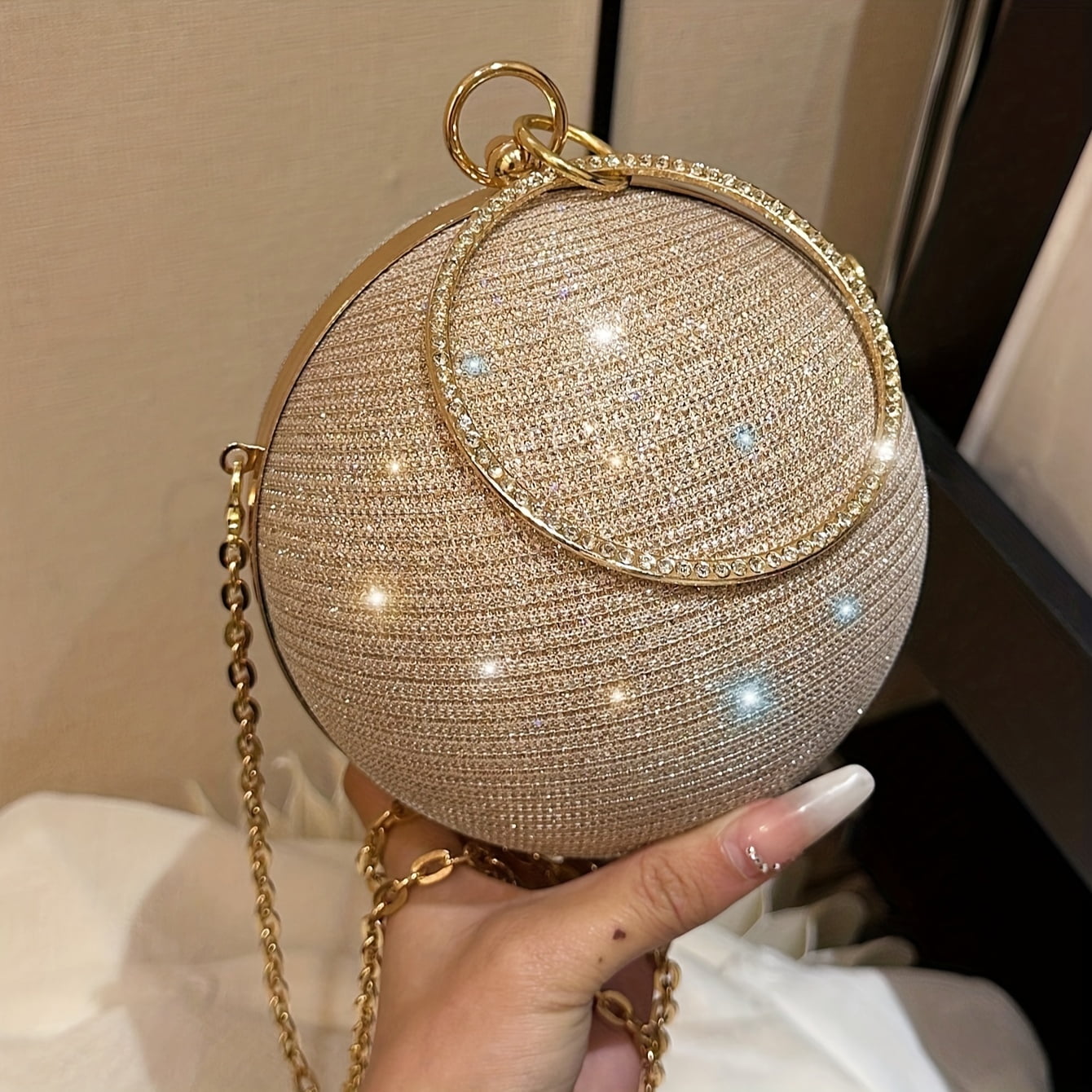 Round clutch bag discount