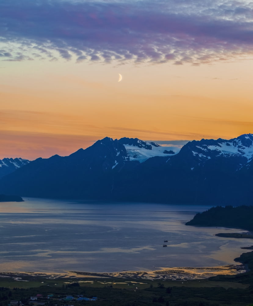 The moon hangs in the sunset above Port Valdez and the Chugach Mountains south of Valdez Alaska United States of America Canvas Art - Zachary Sheldon Design Pics (14 x 17)