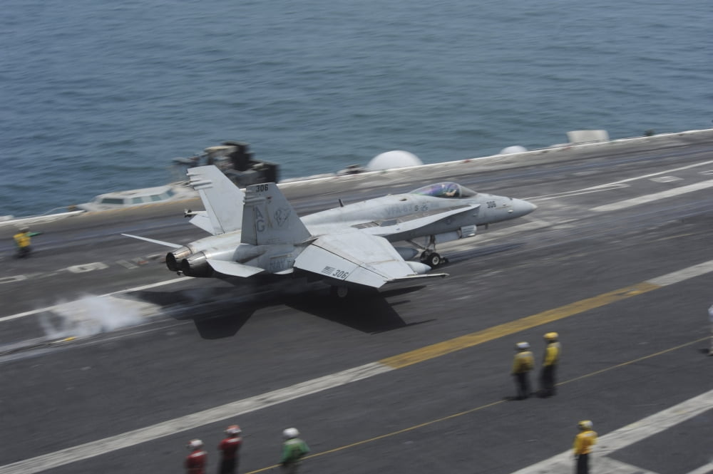 n FA-18C Hornet launches from USS Dwight D Eisenhower Canvas Art - Stocktrek Images (35 x 23)