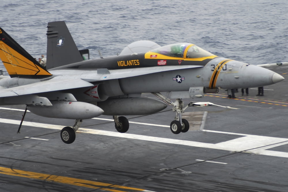 n FA-18F Super Hornet lands aboard the aircraft carrier USS Abraham Lincoln Canvas Art - Stocktrek Images (35 x 23)