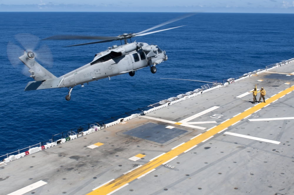 n MH-60S Sea Hawk helicopter lifts off the flight deck of USS Essex Canvas Art - Stocktrek Images (35 x 23)