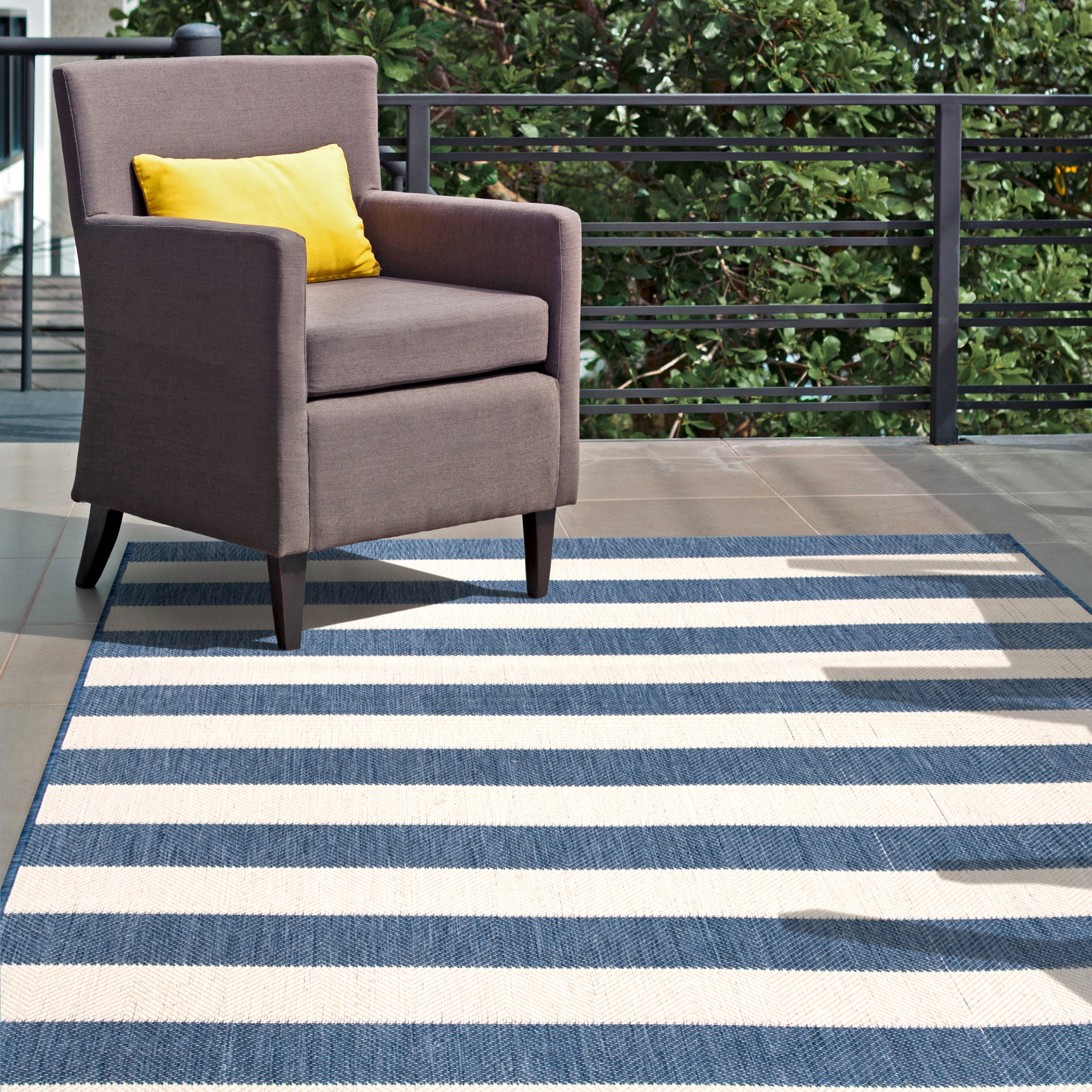 Easy-Care Striped Synthetic 5'3" x 7'6" Outdoor Area Rug in Blue
