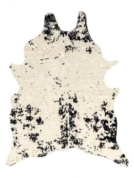 Black and Ivory Tufted Synthetic Cowhide Shaped Area Rug