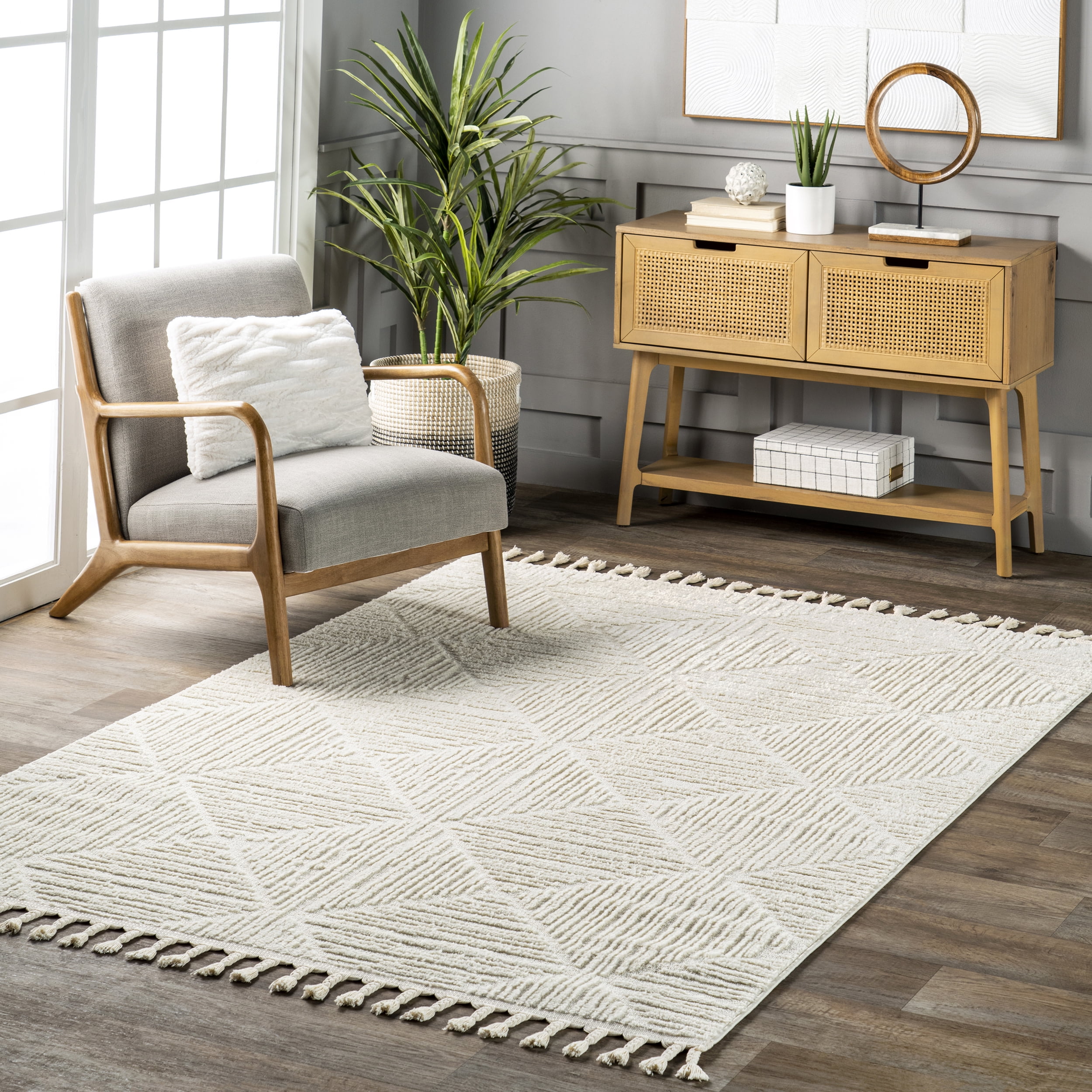 Cream Geometric Textured Synthetic Tasseled Area Rug
